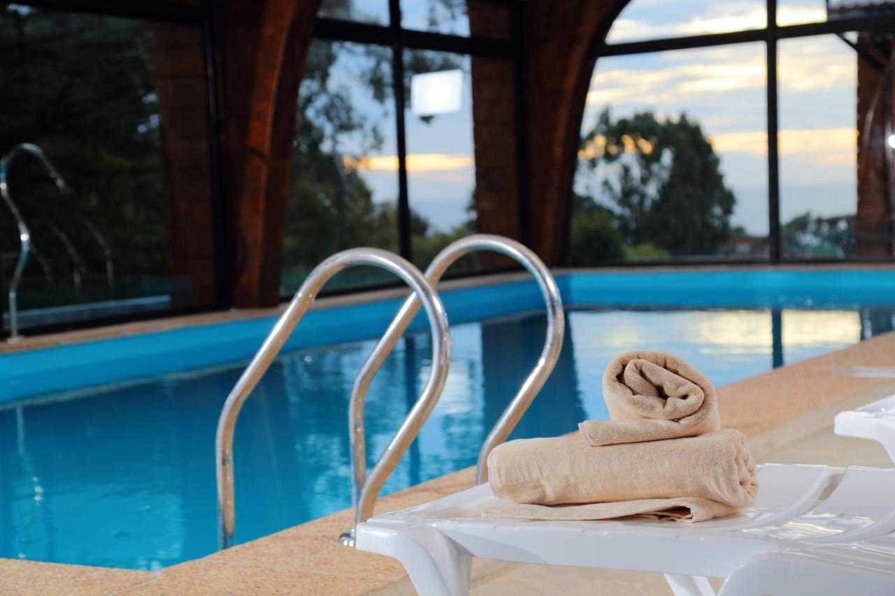 Cabañas y Spa Costa Patagonia - Piscina Climatizada Pichilemu Exterior foto